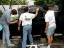 No, they're not waxing a car...