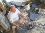 Jon 'carves' tombstones